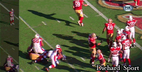 DHS-Cardinals-Olineman-kicks-Alex-Boone.gif