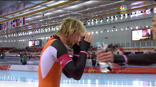 Michel and Ronald Mulder hug