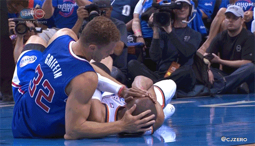 Blake Griffin rubs Russell Westbrook's head