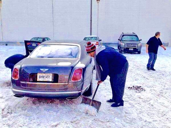 Derrick Rose shoveling