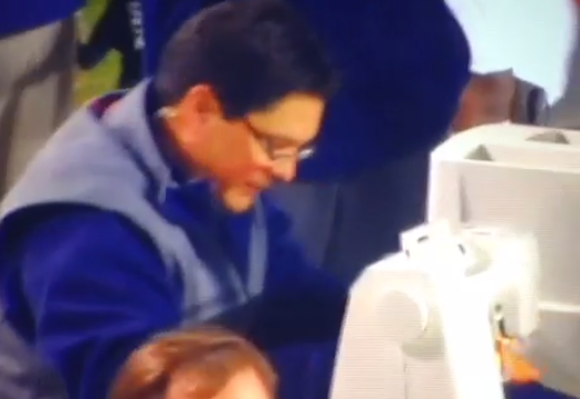 Guy sewing on sideline Auburn Alabama